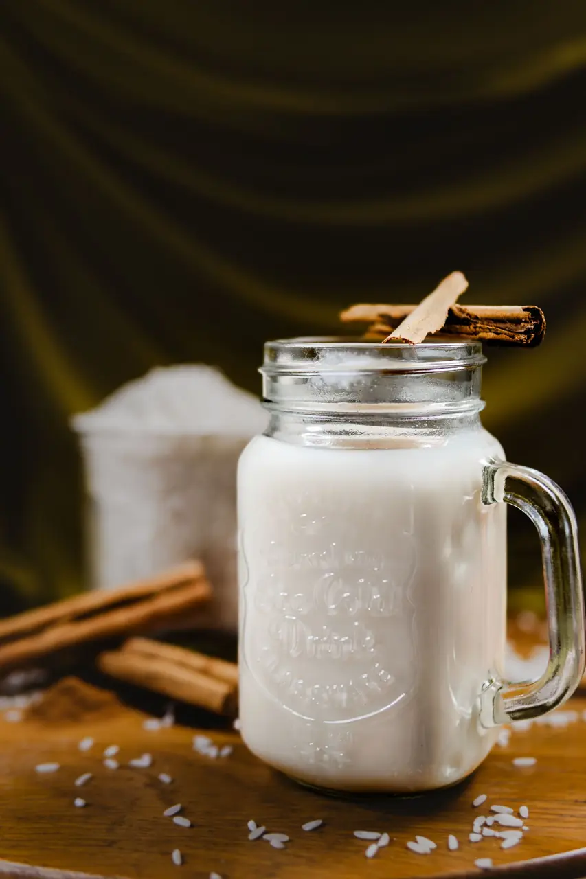 Horchata in a glass jar with cinnamon